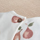 White fruit-print romper neckline with snap closure and leaf graphic