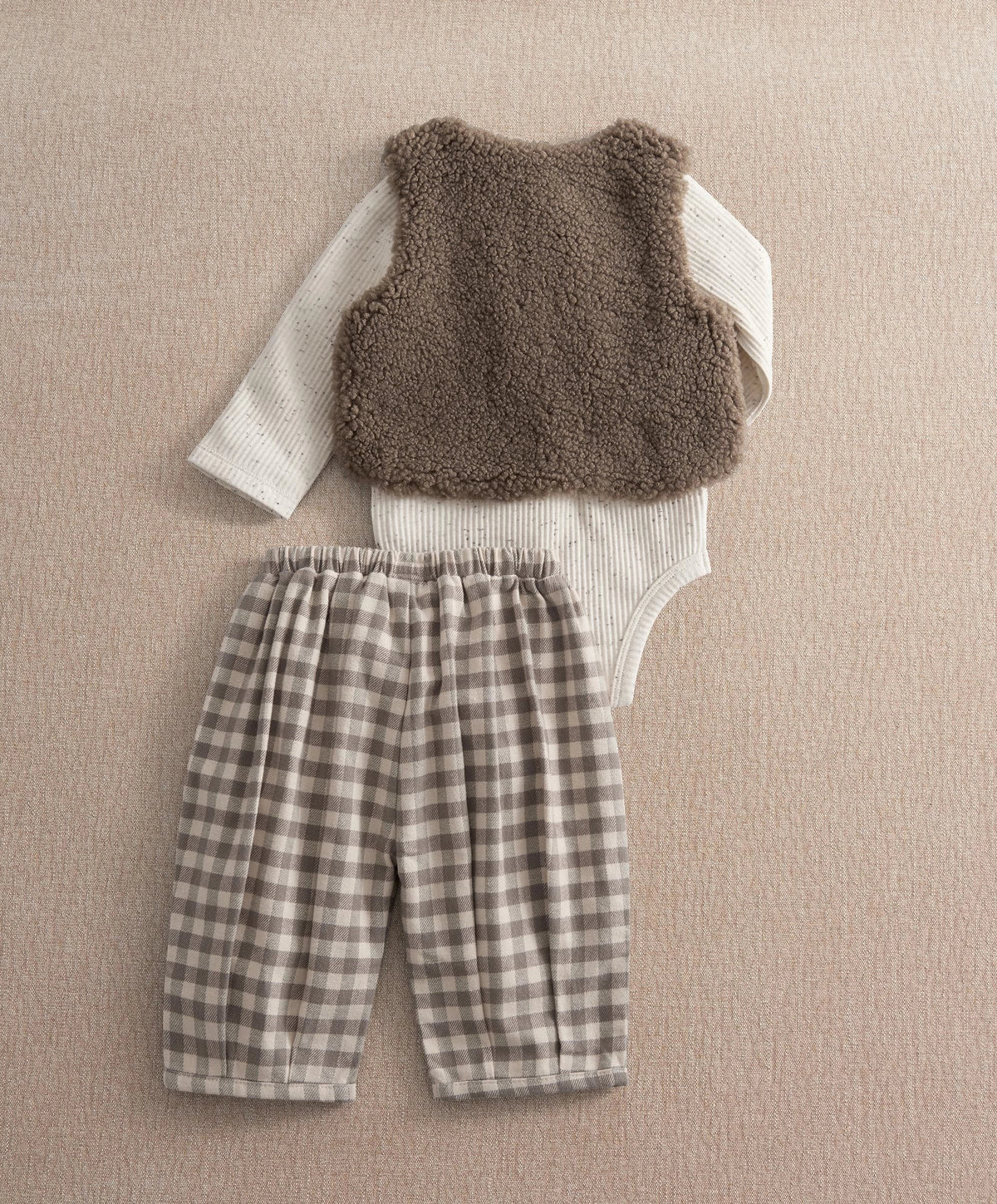Brown borg sleeveless waistcoat with white bodysuit and gray plaid trousers set