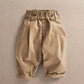 Tan toddler trousers with button waist and cuffed legs
