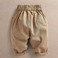 Tan toddler trousers with elastic waist and side pocket
