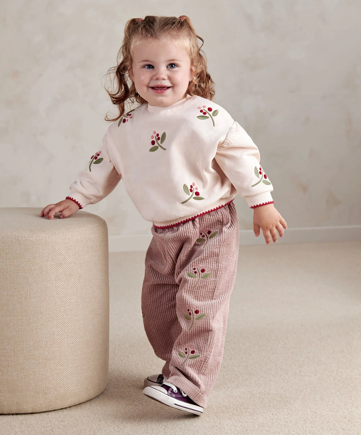 Berry cord trousers in berry pink with floral embroidery, elastic waistband and cuffs