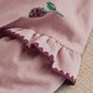 Light pink sweatshirt cuff with berry print and dark plum scalloped trim