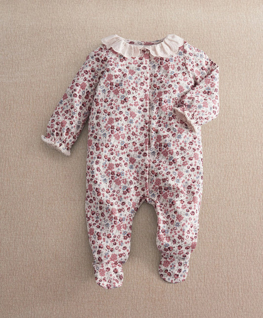 Ditsy floral baby romper with snap button front and long sleeves