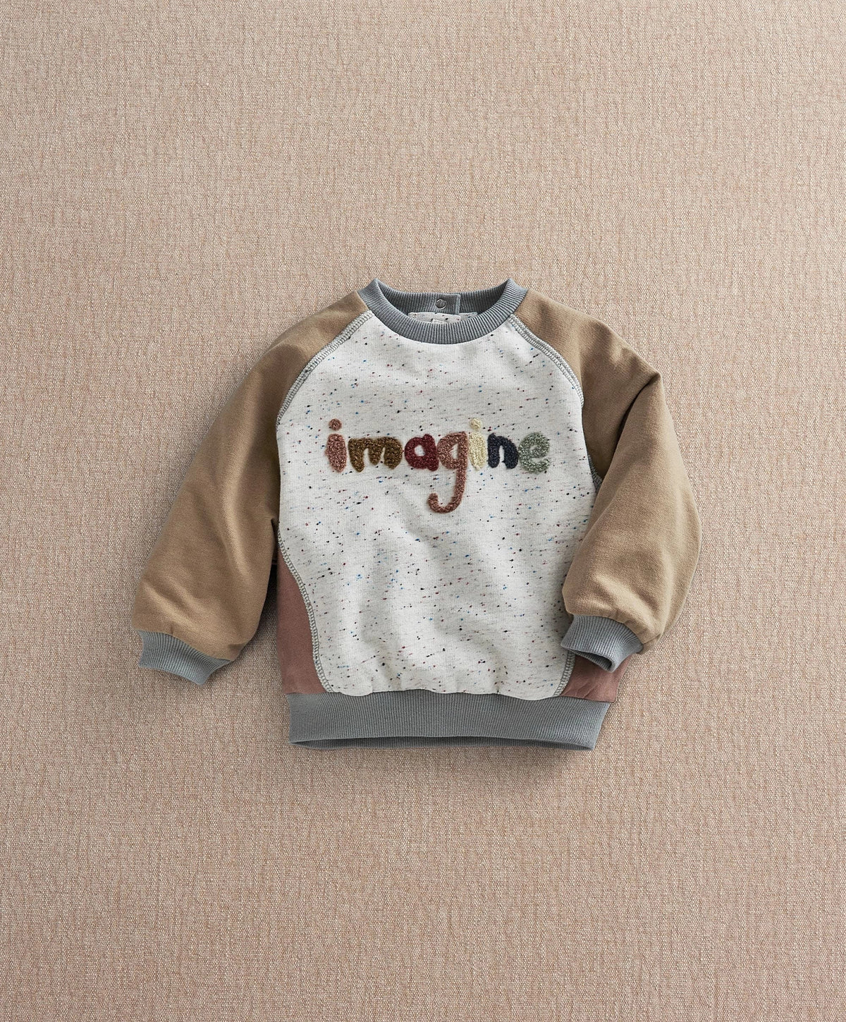 Speckled raglan sweatshirt with 'imagine' graphic, beige sleeves, gray trim