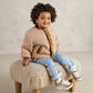 Checked jacket with brown corduroy trim and snap front worn by child