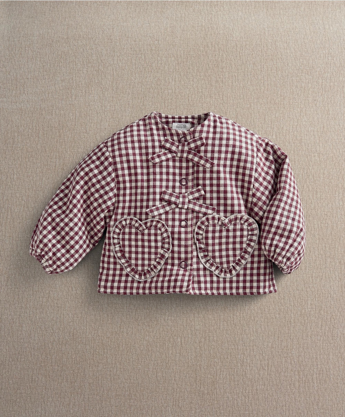 Red gingham jacket with heart-shaped patch pockets and front ties