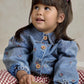 Denim jacket with button front and embroidered motifs, light blue, toddler wearing
