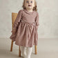 Red and white gingham long-sleeve dress with gathered skirt and ruffled neckline