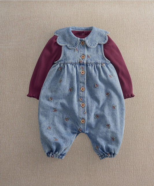 Denim dungarees with ribbed burgundy sleeves, embroidered bows, button front, snap legs