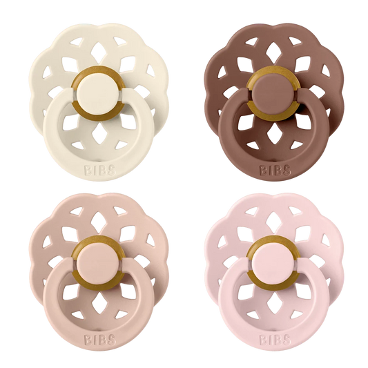 2-pack latex pacifiers, floral cutout shields, gold rings; white and blush pink