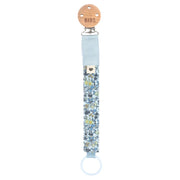BIBS pacifier clip with blue denim and chamomile floral fabric strap and ring