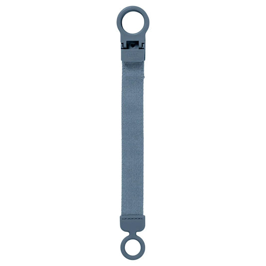 Petrol-blue pacifier clip with fabric strap and two plastic loop ends