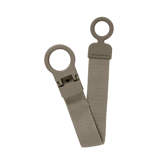 Loop-style pacifier clip with light gray fabric strap and circular ring