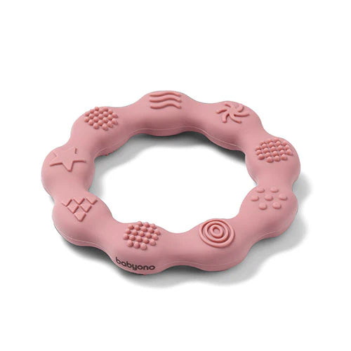 Pink silicone teether ring with textured bumps and swirls for babies