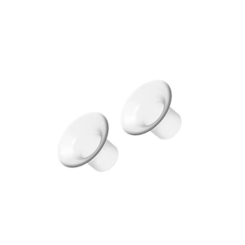 Breast pump spare parts: pair of white silicone membranes with small central openings