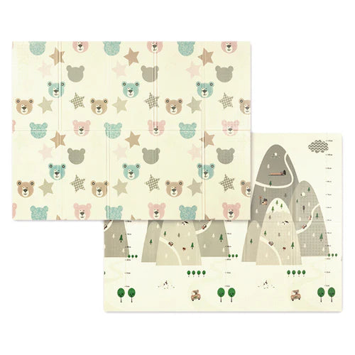 Foam play mat with animal and star pattern, pale cream and blue-green accents.