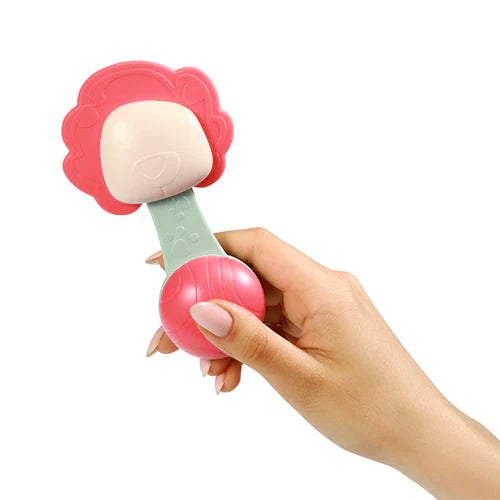 Red rattle teether in hand: pink flower teether head and mint handle