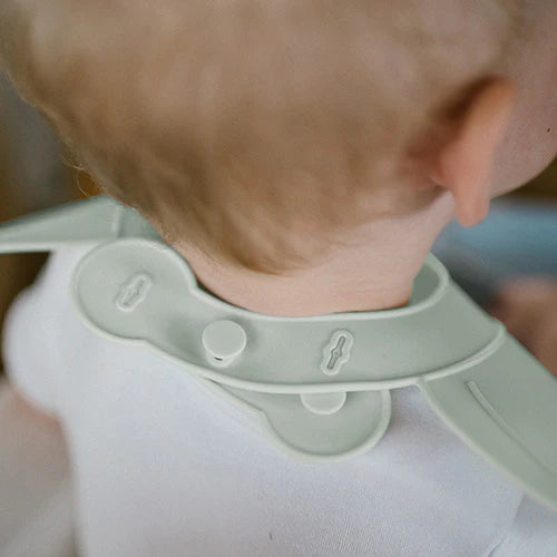 Mint silicone baby bib with adjustable lock, neck strap and fastening dots