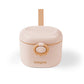Beige portable milk powder dispenser with round lid, pouring spout, and handle