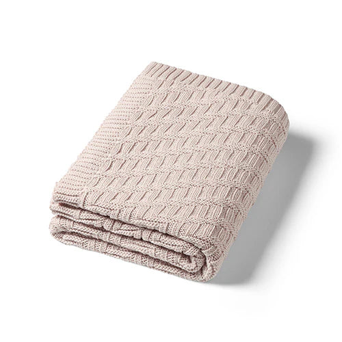 Cotton knitted blanket in beige, ribbed chevron knit with folded edge