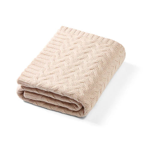 Merino wool blanket, light beige cable-knit fold