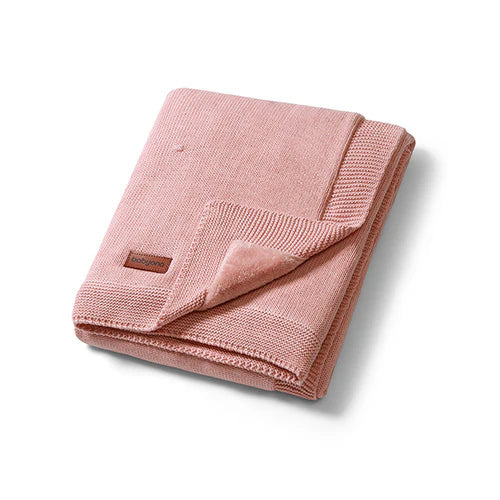 Pink cotton blanket with flannel lining, folded and bound edge