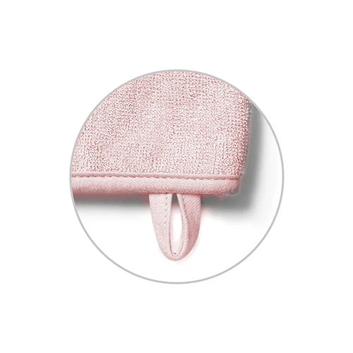 Pink bamboo baby wash mitt close-up with hanging loop strap