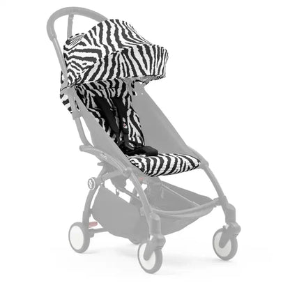 Zebra print stroller canopy and seat cover with black harness straps