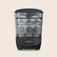 Sterilizer dryer with dark base and clear chamber, showing bottle racks, front view