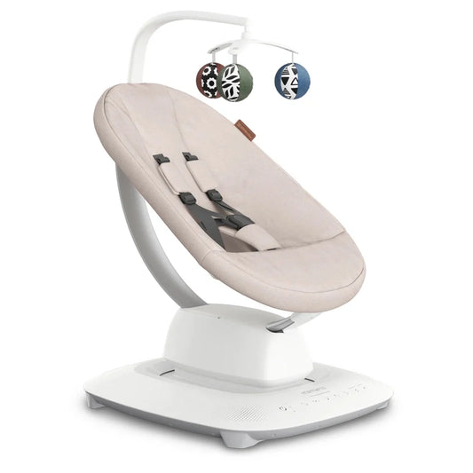 Mamaroo baby swing with cream seat and hanging toys