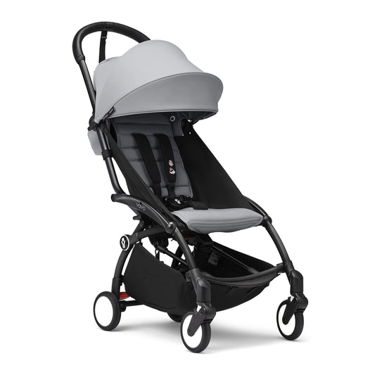 Black-framed baby stroller with light gray canopy and seat, compact 6+ bundle.