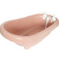 Pale pink bathtub with faucet deck and two soap dispensers on the rim