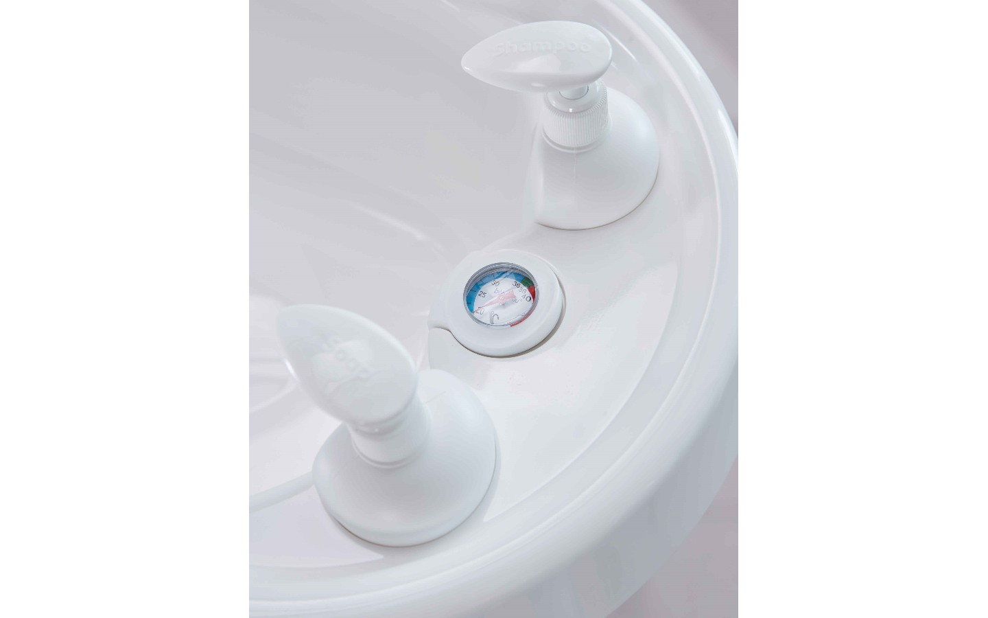 White bathtub thermostat control with gauge and two front knobs