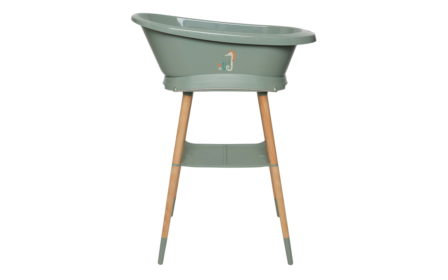 Green bathtub on wooden stand legs with seahorse decal