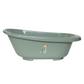 Light green bathtub with seahorse decal, oval rim and pedestal base feet