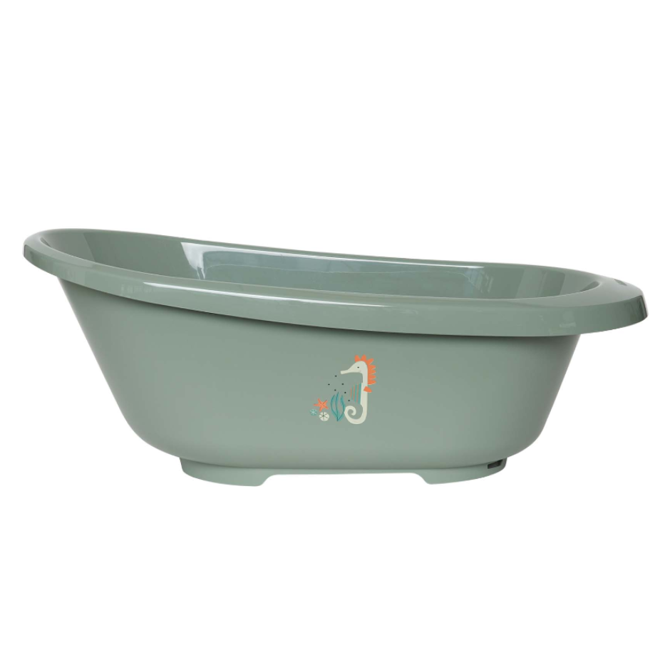 Light green bathtub with seahorse decal, oval rim and pedestal base feet