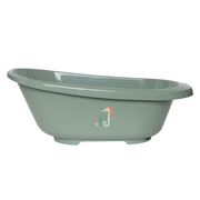 Light green bathtub with seahorse decal, oval rim and pedestal base feet