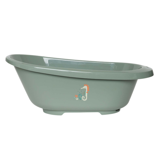 Light green bathtub with seahorse decal, oval rim and pedestal base feet