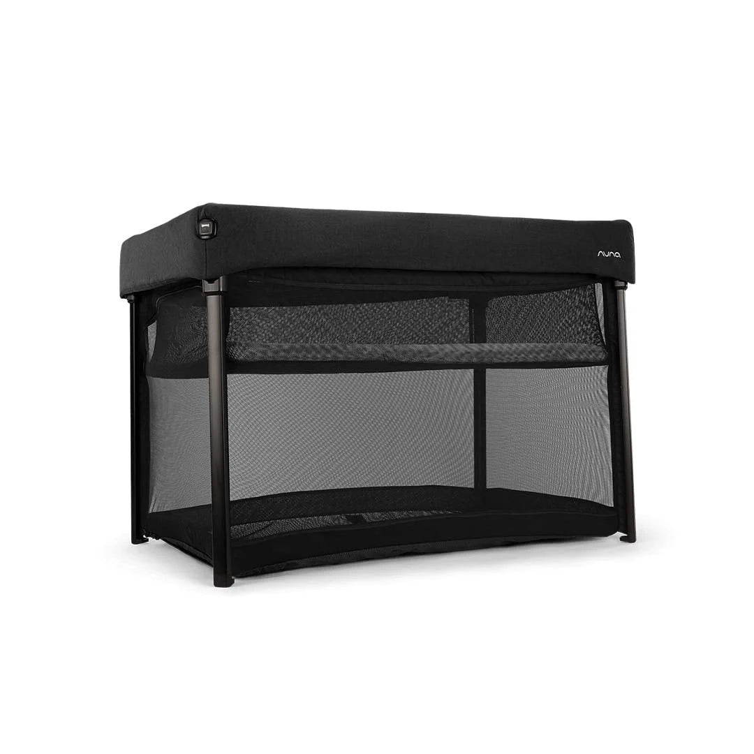 Black baby playard with mesh sides, open front and padded canopy top