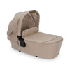 Stroller carry cot with beige fabric base, canopy hood with mesh window and black handle