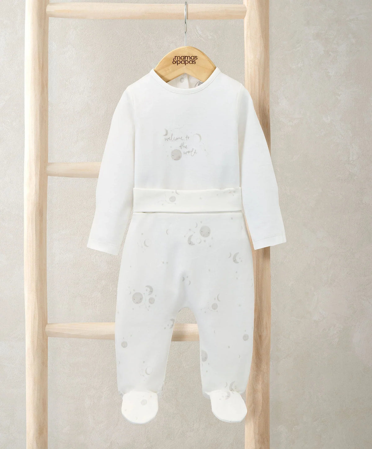 White long-sleeve footed baby bodysuit with space-print pants