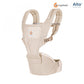 Beige hip seat baby carrier with padded straps and front storage pocket