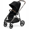 Black stroller with padded seat, hood, and five-point harness, front swivel wheels