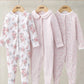 Three footed long-sleeve sleepsuits with snap buttons: floral white, pale pink, pink ditsy