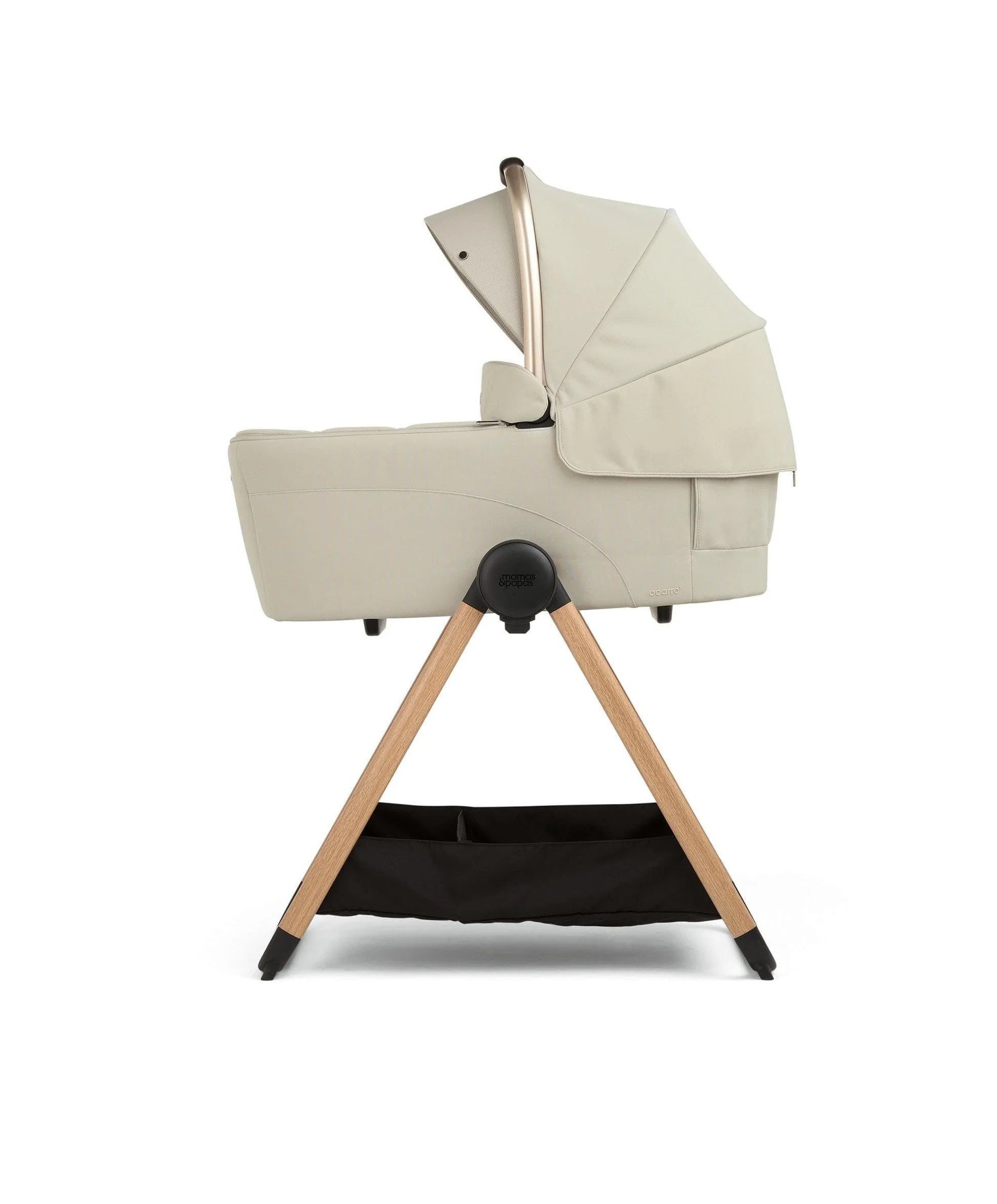 Ocarro 2 carrycot in cream with open hood and fabric panel on tripod legs