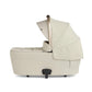 Ocarro 2 carrycot in cream with padded hood and adjustable standing base
