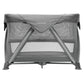 Grey bassinet with removable canopy and see-through mesh panels, front view