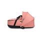 Yoyo³ newborn shell in pastel pink with black strap and front carry latch